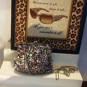 Ladies SASHA hand bag. With a long chain.